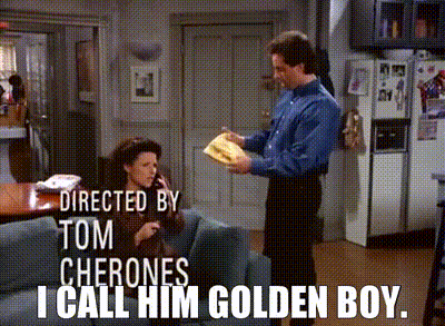 Man Next To Woman Saying I Call Him Golden Boy GIF