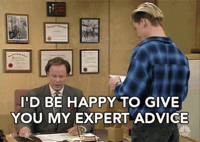 Man Offering Expert Advice At Desk GIF