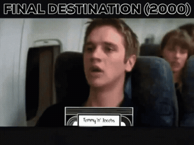 Man On Airplane Holding Tommy 'N' Jacobs VHS Tape GIF
