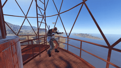 Man On Balcony Overlooking Ocean GIF