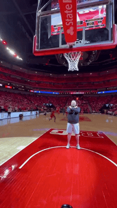 Man On Basketball Court In Front Of State Farm Hoop GIF