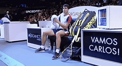 Man On Bench Beside Babolat Bag GIF