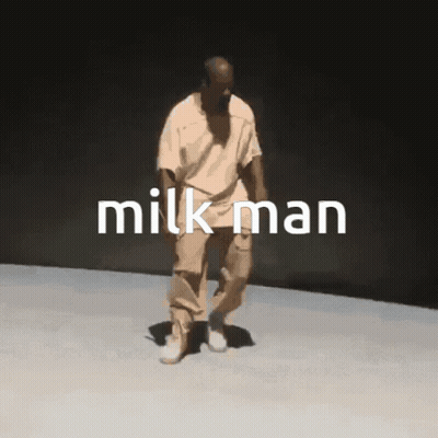 Man On Black Background With Milk Man Text GIF