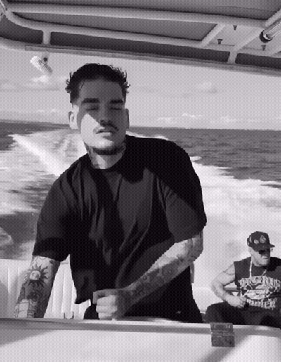 Man On Boat In Dirty Bastard Shirt GIF