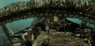 Man On Boat With Giant Snake Coming Out Of Mouth GIF