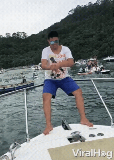 Man On Boat With John Shirt GIF