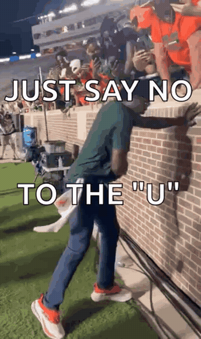 Man On Brick Wall Saying Just Say No To The U GIF