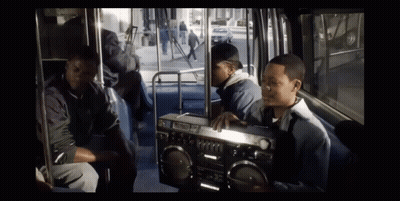 Man On Bus Holding Panasonic Boombox GIF