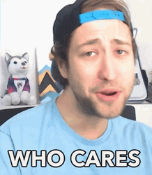 Man On Cap Who Cares GIF