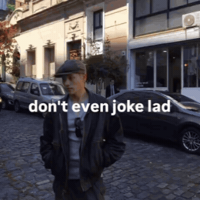 Man On Cobblestone Street Saying Don't Even Joke Lad GIF