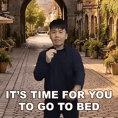 Man On Cobblestone Street Saying It's Time For You To Go To Bed GIF