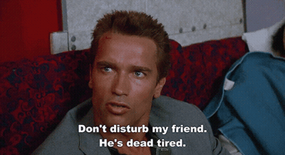Man On Couch Don't Disturb My Friend He's Dead Tired GIF