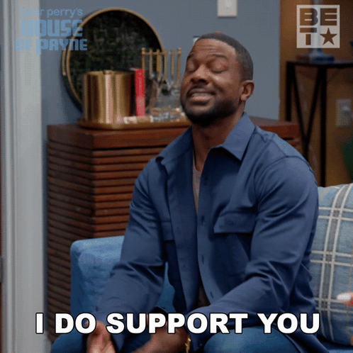 Man On Couch Eyes Closed Says I Support You GIF