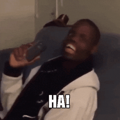 Man On Couch Holding Phone Saying Hai GIF