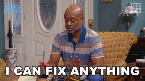 Man On Couch Holding Screwdriver Says I Can Fix Anything GIF