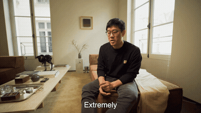 Man on Couch in Living Room Saying Extremely