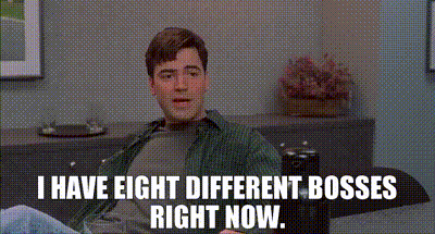 Man On Couch Saying I Have Eight Different Bosses GIF