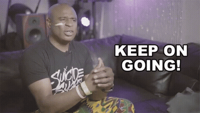 Man On Couch Saying Keep On Going GIF