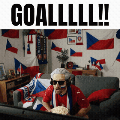 Man On Couch Watching Game Saying Goallll GIF
