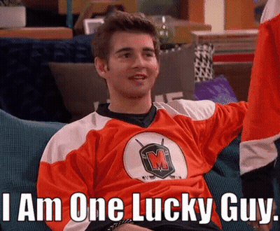 Man On Couch Wearing I Am One Lucky Guy Jersey GIF
