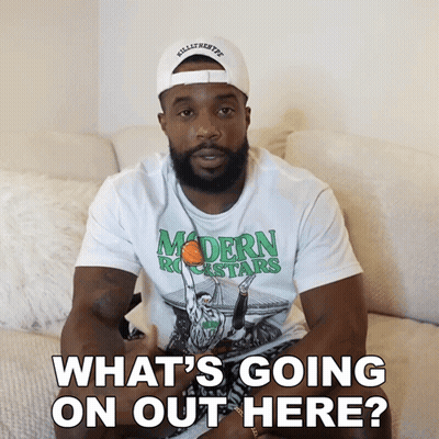 Man On Couch Wearing Modern Rockstars T-Shirt GIF