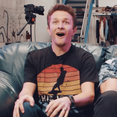 Man On Couch Wearing Shirt Saying This Is GIF