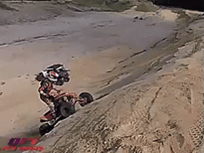 Man On Dirt Bike Doing Trick On Hill GIF