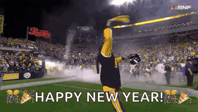 Man On Football Field With Flag Saying Happy New Year GIF