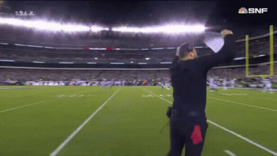 Man On Football Field With SNF Logo GIF