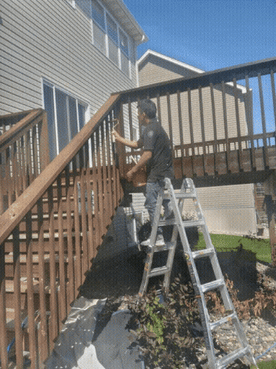 Man On Ladder Painting Deck GIF