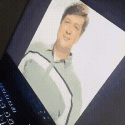 Man On Laptop Screen GIF