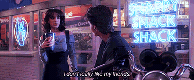Man On Motorcycle Talking To Woman Outside Snack Shack GIF