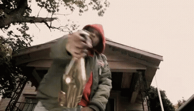 Man On Porch Holding Champagne GIF