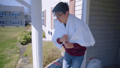 Man On Porch With White Towel GIF