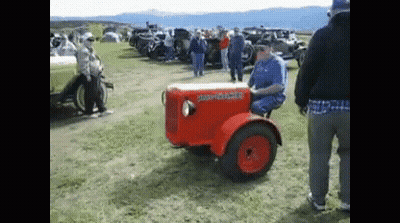 Man On Red Massey Ferguson Tractor GIF
