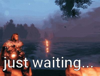 Man On Rock By Water Saying Just Waiting GIF