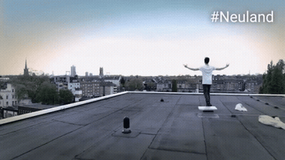 Man On Rooftop With Arms Outstretched #Neuland GIF