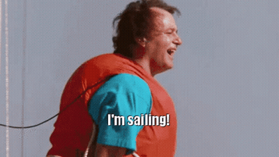 Man On Sailboat Saying I'm Sailing GIF