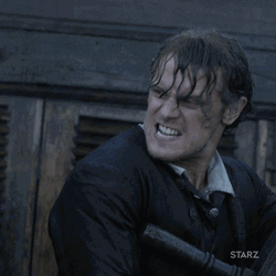 Man On Ship Wheel During Thunderstorm GIF