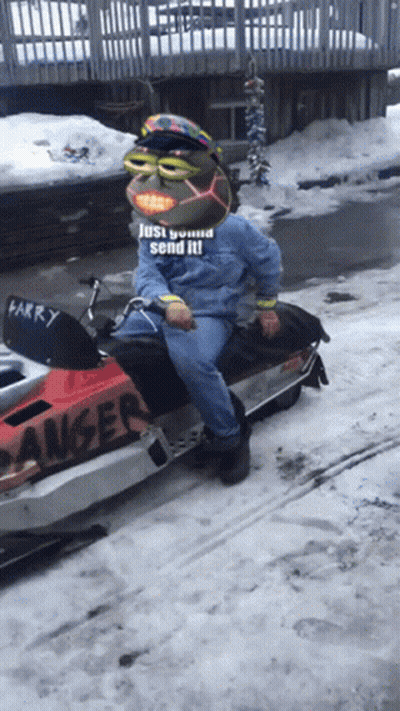 Man On Snowmobile With Larry GIF