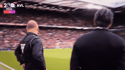 Man On Soccer Field In Front Of Scoreboard Saying SL5 GIF