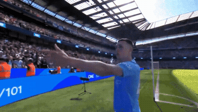 Man On Soccer Field In Front Of Sign Saying 7 101 GIF