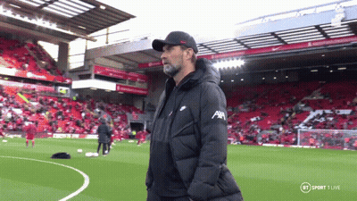Man On Soccer Field Wearing AXA Jacket GIF
