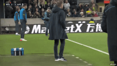 Man On Soccer Field With Maxi Advertisement GIF