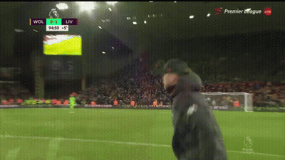 Man On Soccer Field With Scoreboard Wol 0-1 Liv GIF