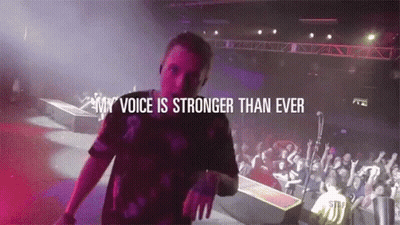 Man On Stage Saying My Voice Is Stronger Than Ever GIF