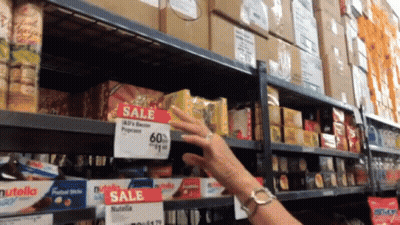 Man On Stage With Arms Outstretched And Crowd GIF