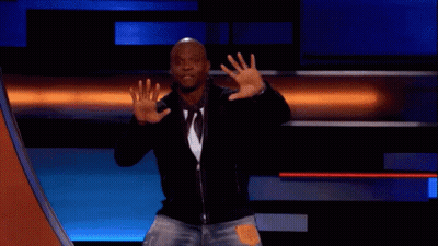 Man On Stage With Microphone And Crowd GIF