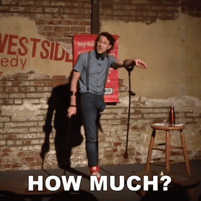 Man On Stage With Westside Comedy Sign GIF