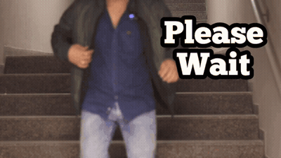 Man On Stairs Saying Please Wait GIF